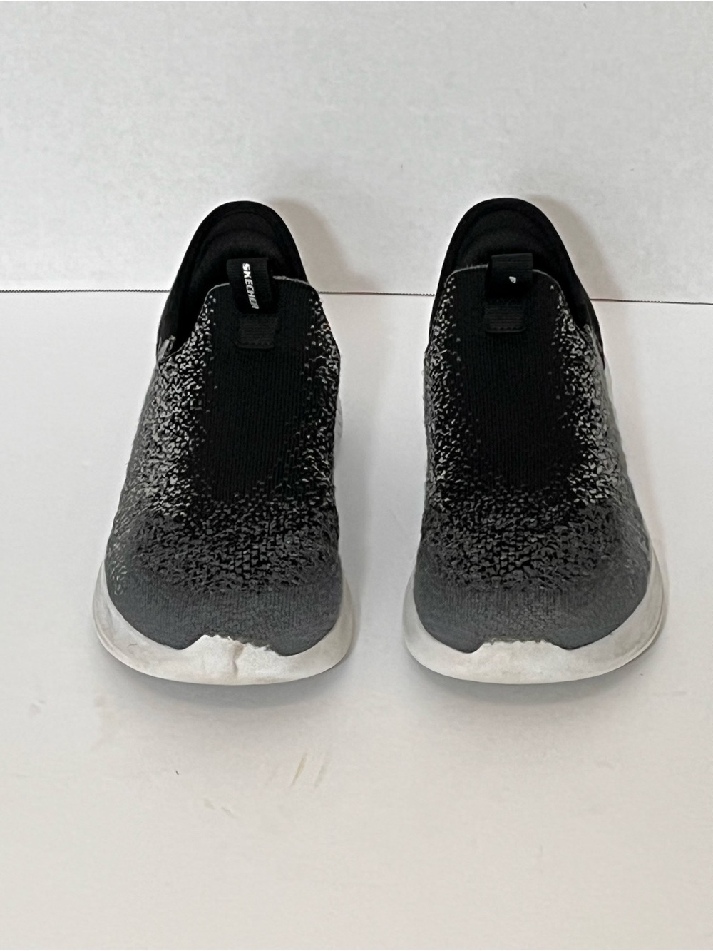 Skechers kids Black Slip-On Knit Sneakers with White Sole